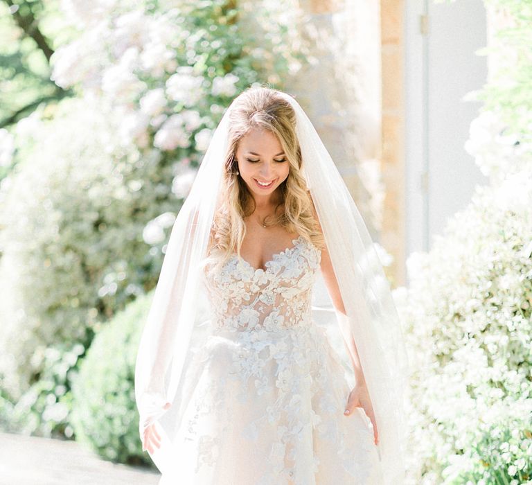 Bride in Strapless Liz Martinez Ballgown Wedding Dress with Embroidered Flowers | Cathedral Length Veil in Blush Soft Tulle | Country Tipi Wedding with Macramé Arch and Hanging Flowers | Sarah-Jane Ethan Photography