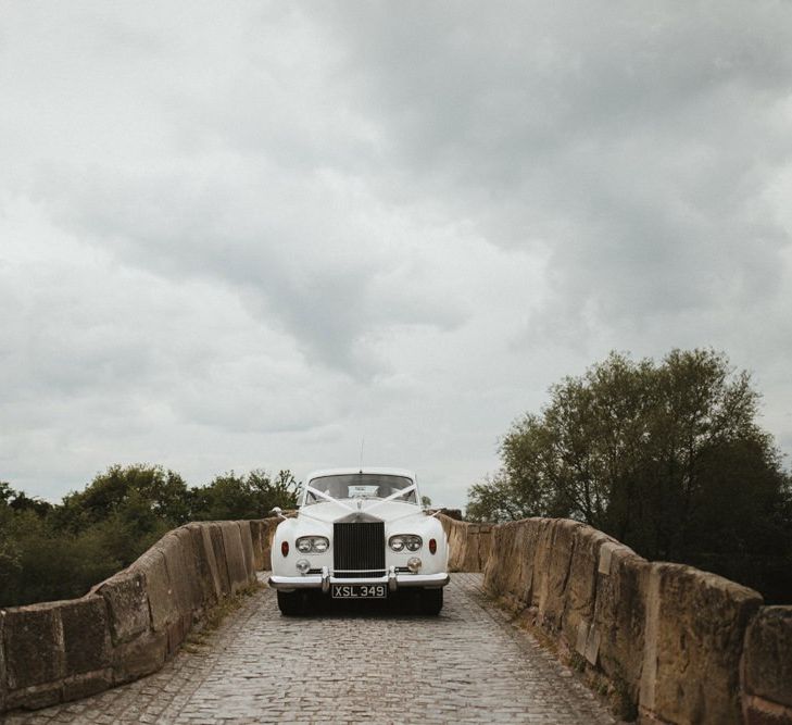 Classic Wedding Car On Way To Ceremony