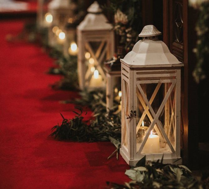 Lantern Aisle Decor With Foliage and Candles in Church