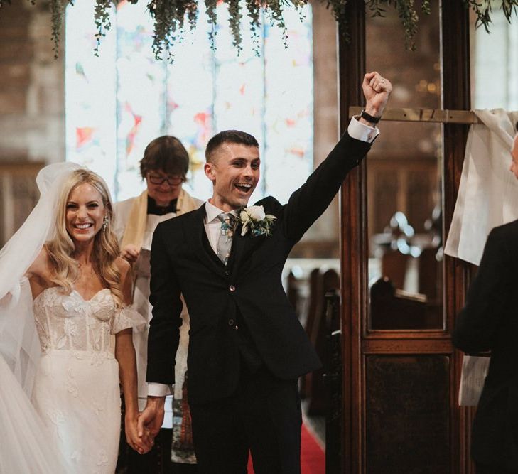 Bride and Groom Celebrate in Church