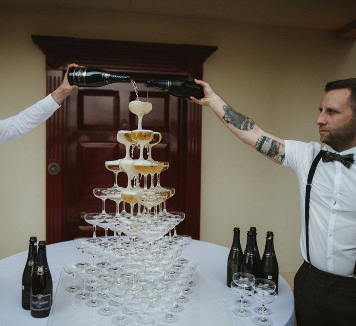 Champagne Tower Being Poured