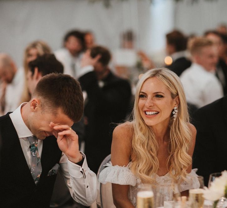 Bride And Groom Enjoy Speeches