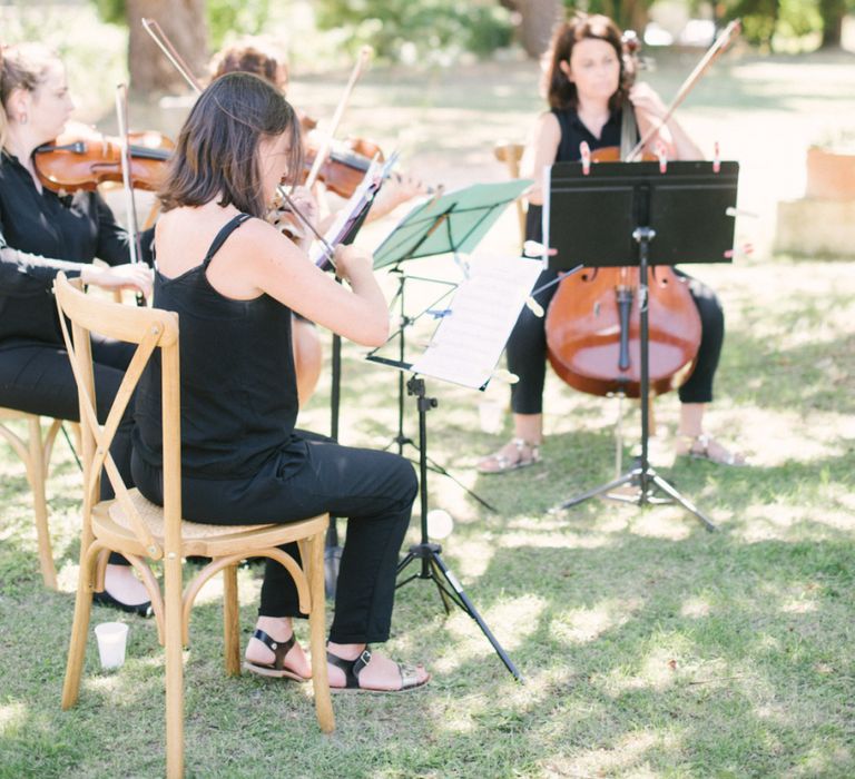 String Quartet Playing During The Wedding Ceremony