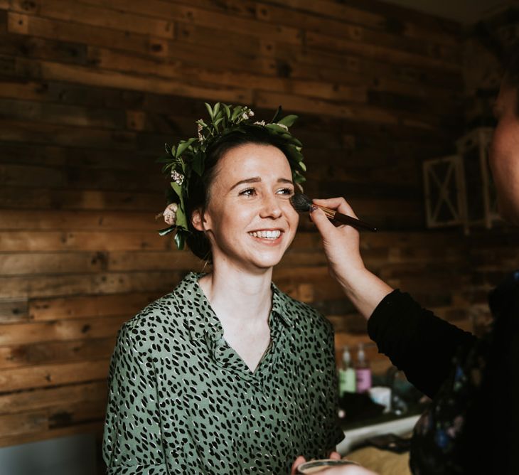 Bridal preparations for rustic outdoor wedding