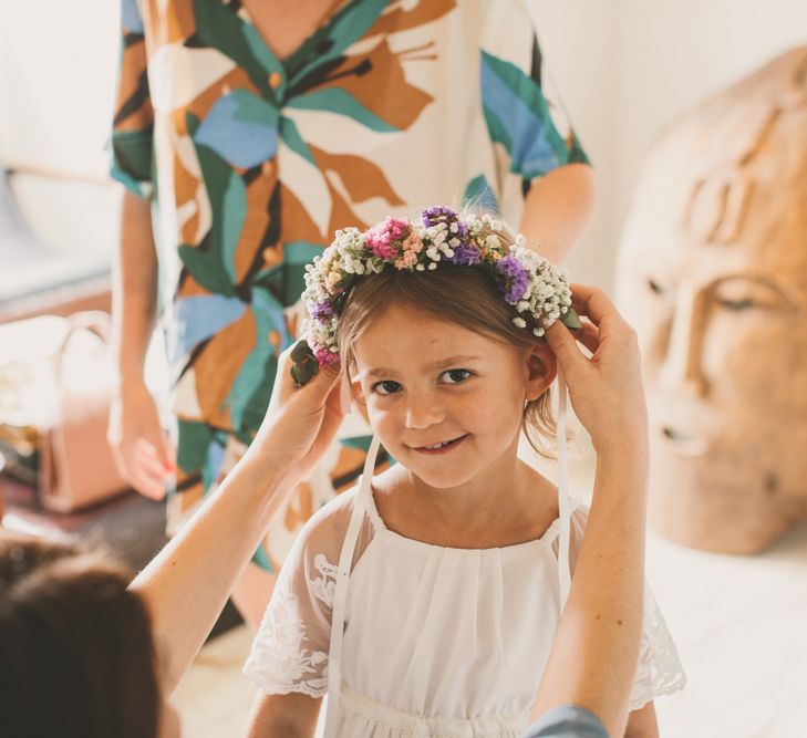 Cute flower girl with flower crown