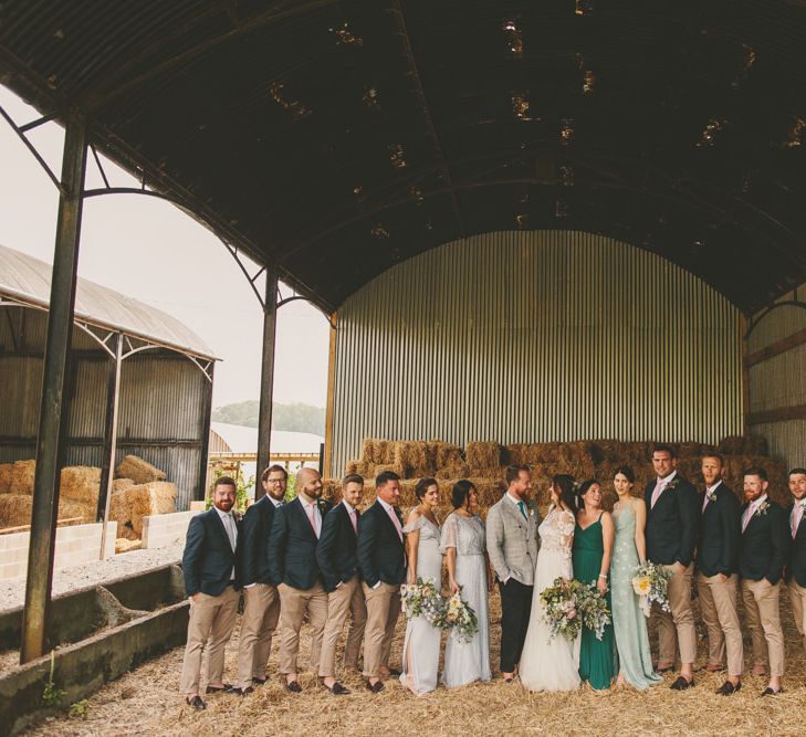 Wedding party in barn wedding venue