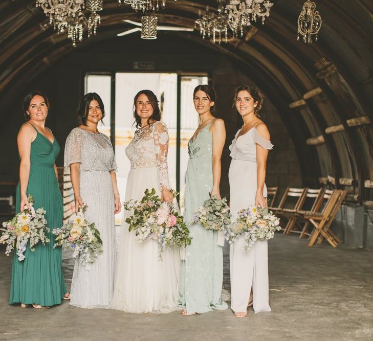 Mismatched green bridesmaid dresses