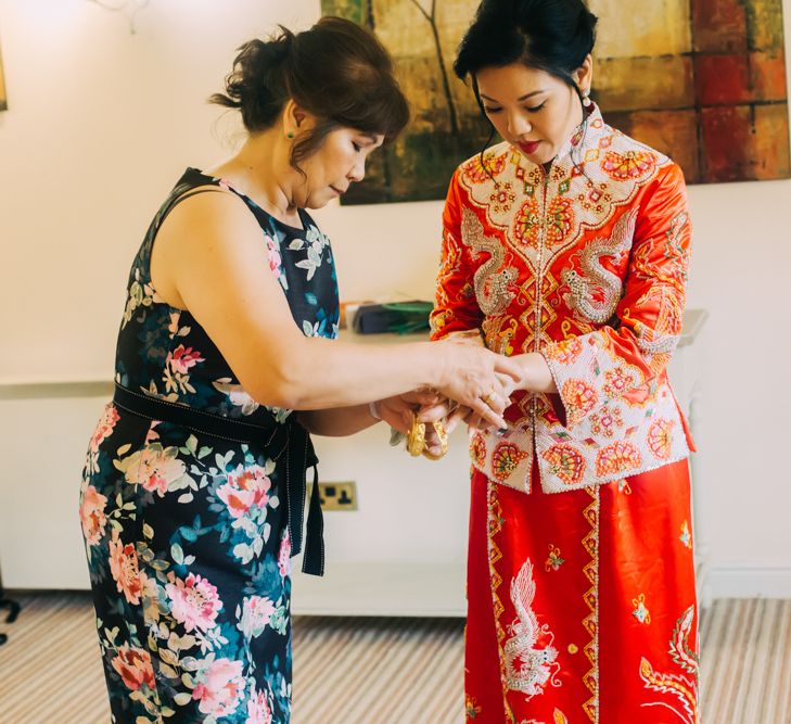 Bride Getting Ready in Red Chinese Wedding Dress