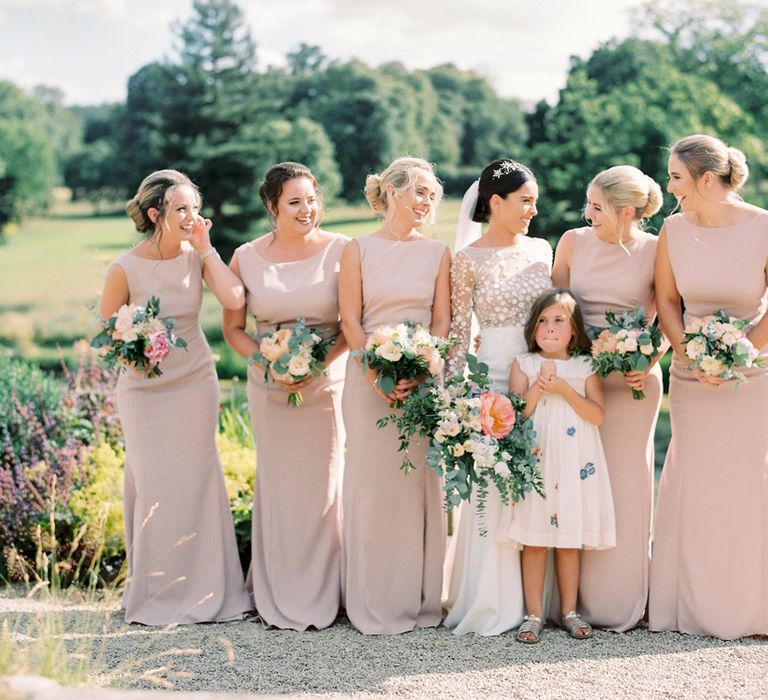 Bridal Party Portrait with Bridesmaids in Pink Dress and Bride in a Rime Arodaky Wedding Dress