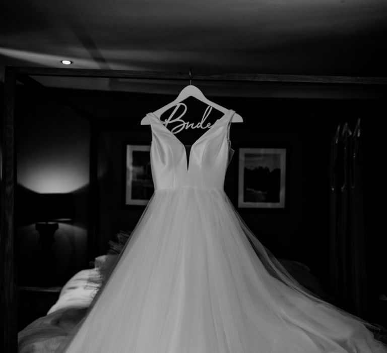 Stella York Wedding Dress Hanging Up on a Bride Hanger