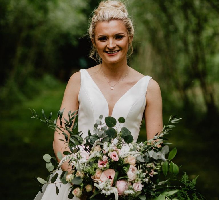 Bride in Stella York Wedding Dress with Romantic Pink, White and Green Bridal Bouquet