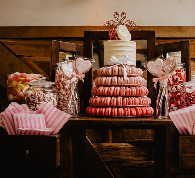 Pink Dessert Table on a Vintage Dresser with Macaron Tower and Retro Sweets in Jars