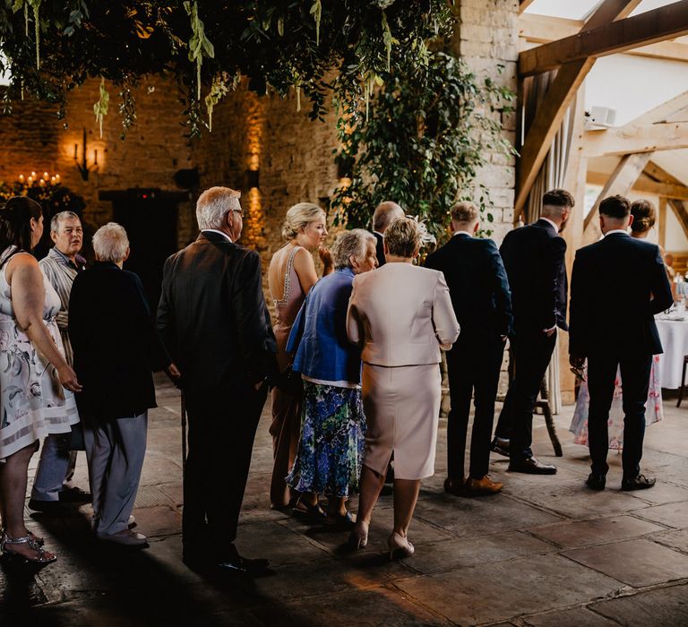 Wedding Guests Queueing for The Wedding Breakfast at Cripps Barn