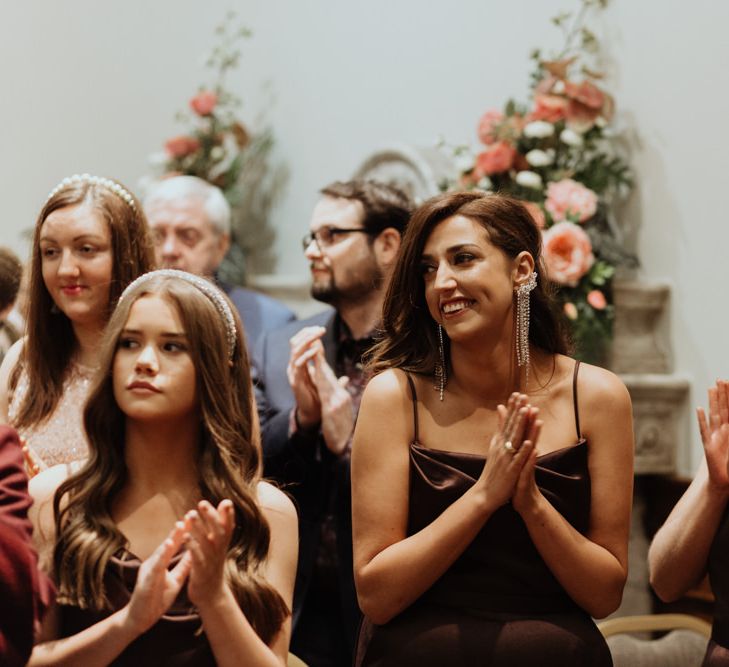 Brown bridesmaid dresses at a party wedding celebration in Liverpool