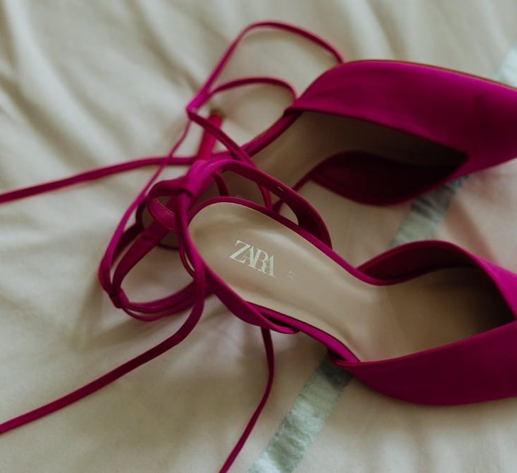 Bright pink statement bridal shoes for glam party wedding in Liverpool