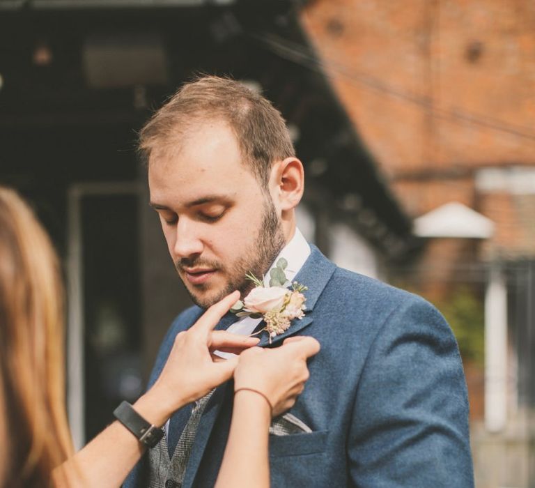 Blush flower buttonhole