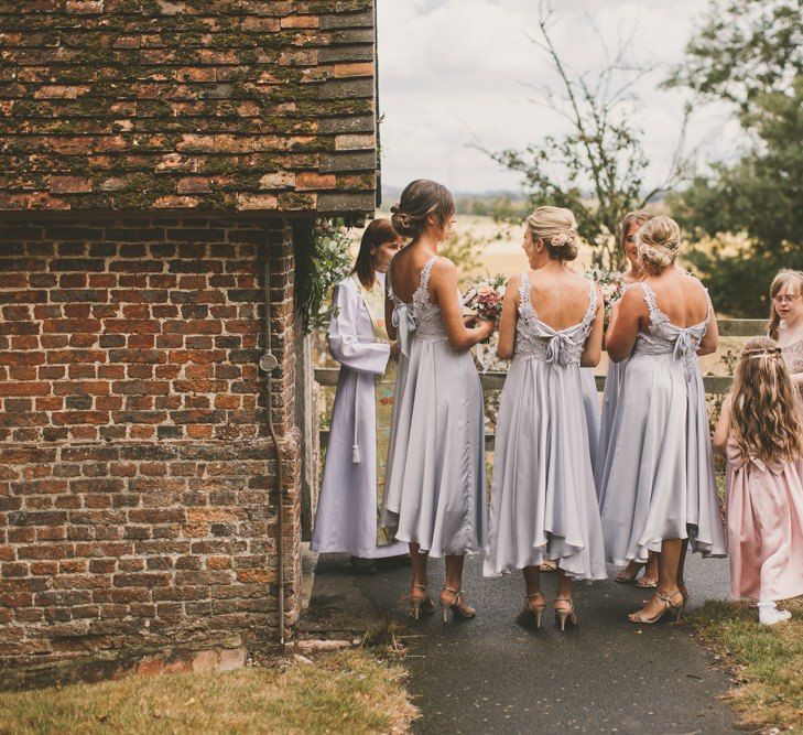 Pale blue bridesmaid dresses for church wedding ceremony