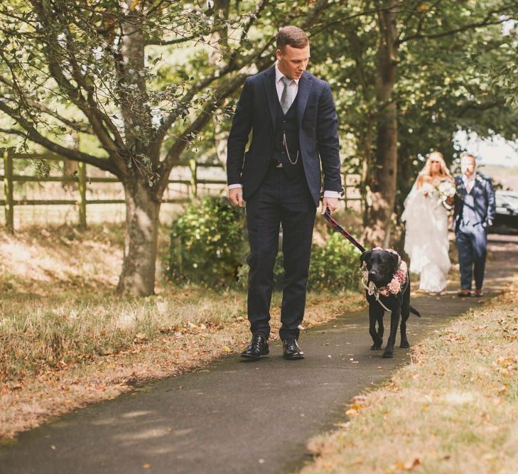 Lyra the dog on her way to ceremony