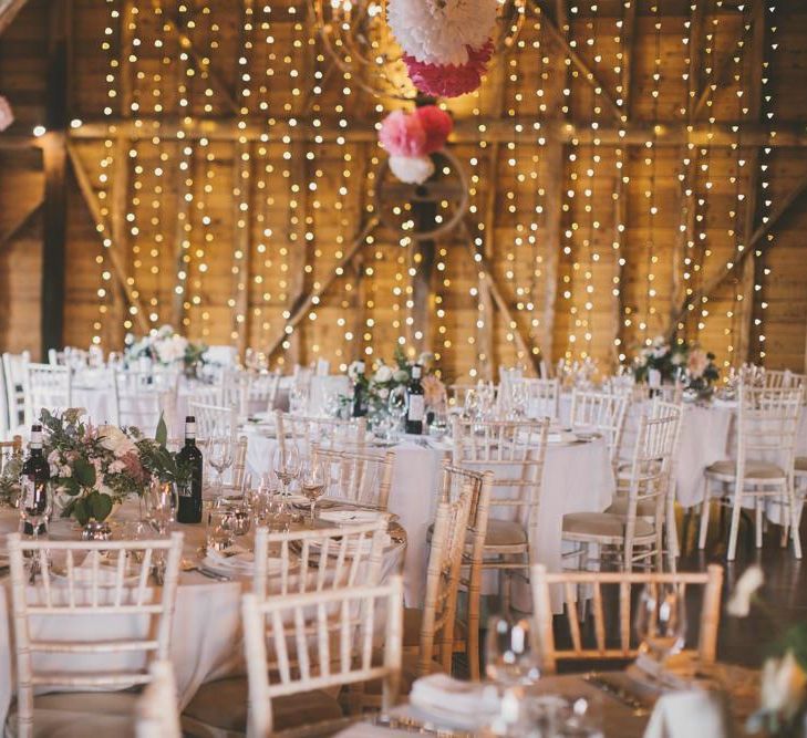 Rustic wedding venue in Kent with pale blue bridesmaid dresses and sweetie table