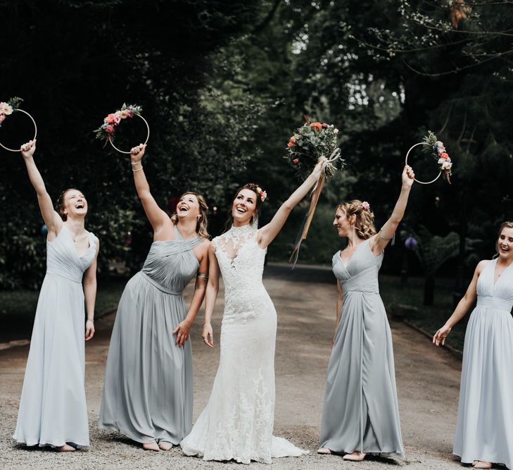 Sleeveless Wedding Dress with Grey Bridesmaid Dresses and Hoop Bouquets