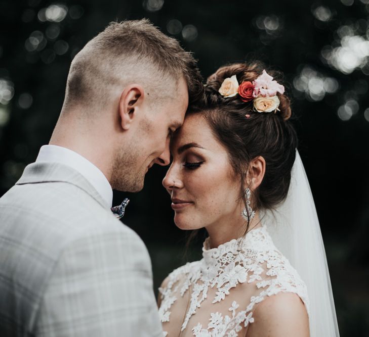 Sleeveless Wedding Dress with Bright Floral Hair Decoration