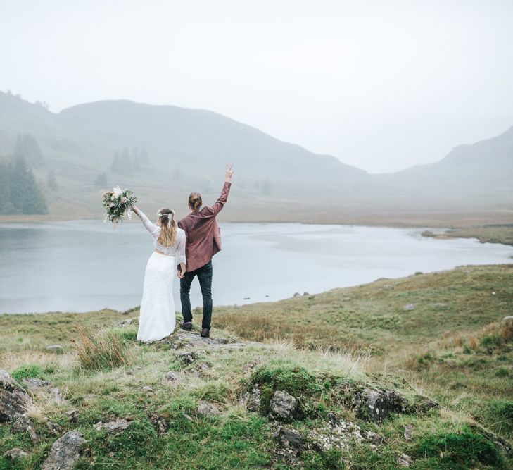 Bride and Groom on a Cliff at Lake District Elopement