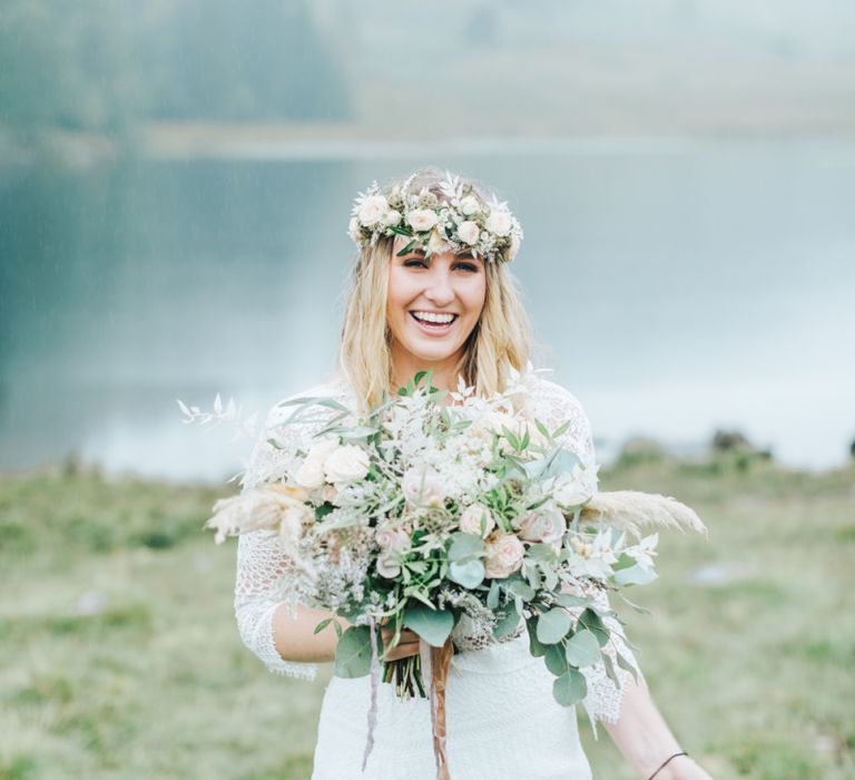 Beautiful Bride Holding a White and Green Wedding Bouquet