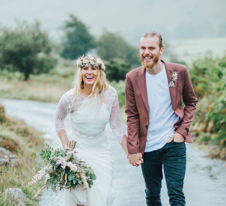 Bride in Crochet Bridal Separates and Groom in Blazer Laughing