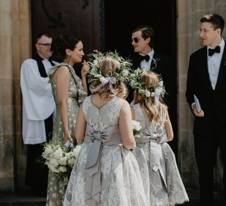 Flower Girls In Grey Dresses With Tie Bow Back and Lace Detail with Flower Crowns