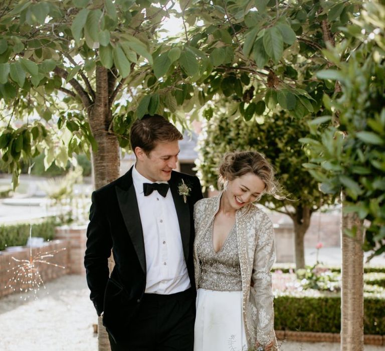 Bride and Groom In Tux and Bridal Coat