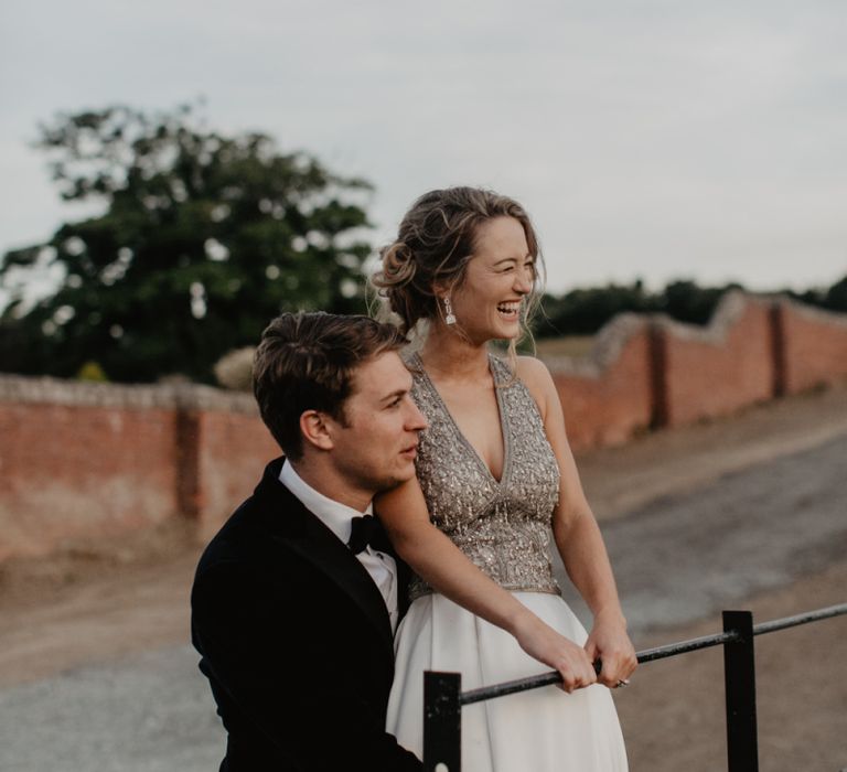 Bride and Groom Look On Into Distance