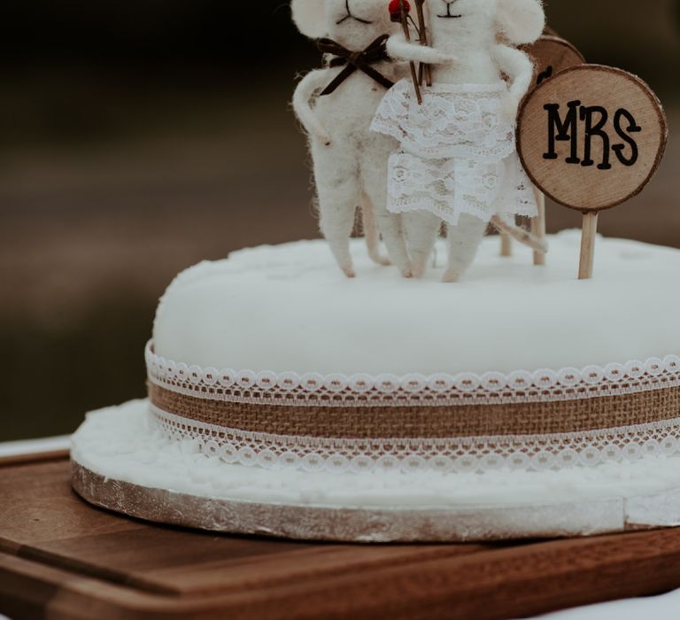 Rustic wedding cake with mouse cake toppers for Eden Barn wedding