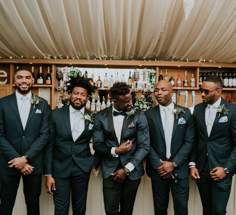 Groom and groomsmen with blue ties at Northamptonshire wedding