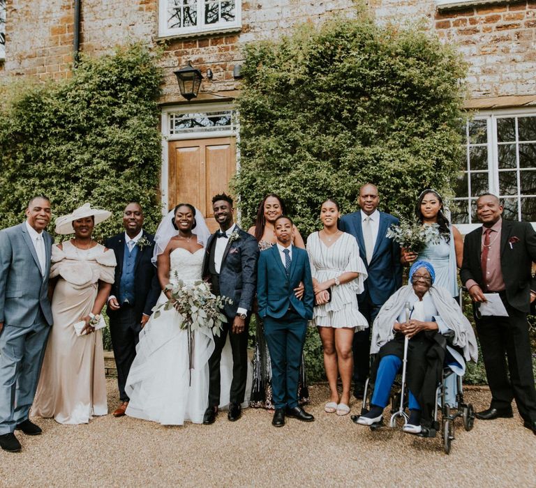 Bride and groom with wedding guests at Crockwell Farm