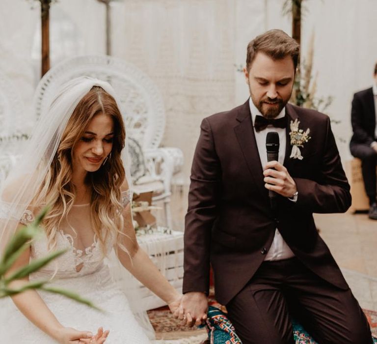 Groom in brown wedding suit