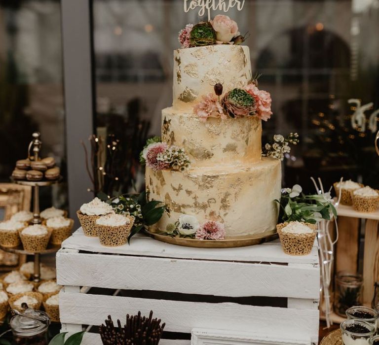 Gold leaf detail wedding cake