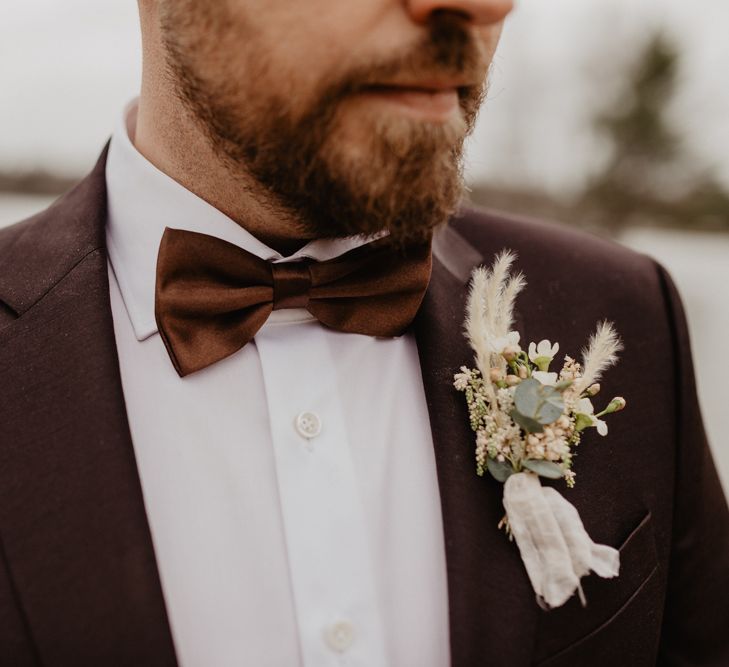 Brown wedding suit with bow tie for Germany wedding