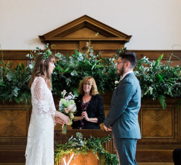 Neon wedding sign and greenery decor at registry office wedding