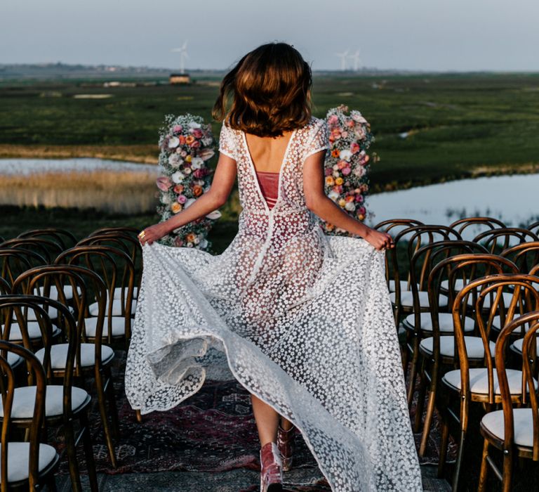 Bride in Lace Wedding running Down the Aisle