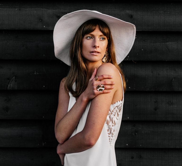 Bride with whisky Fringe in Slip Wedding Dress and Floppy Hat