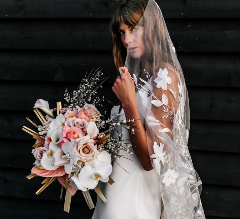 Bride in Slip Wedding Dress with Lace Veil