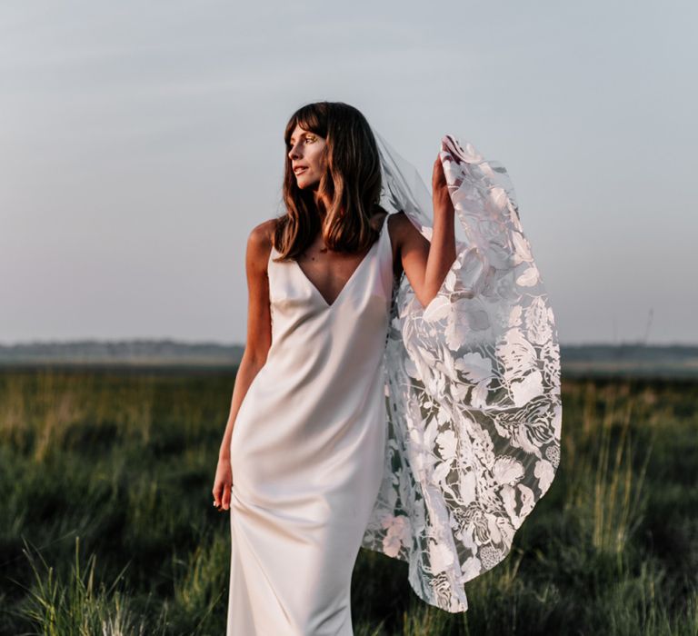 Bride in Slip Wedding Dress with Embroidered Wedding Veil