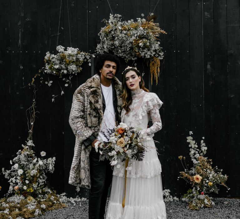 Retro Bride and Groom in High Neck Wedding Dress and Faux Fur Coat