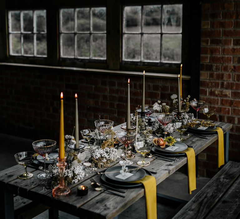 Retro Table Decor with Yellow Candles and Napkins and Dried Flowers