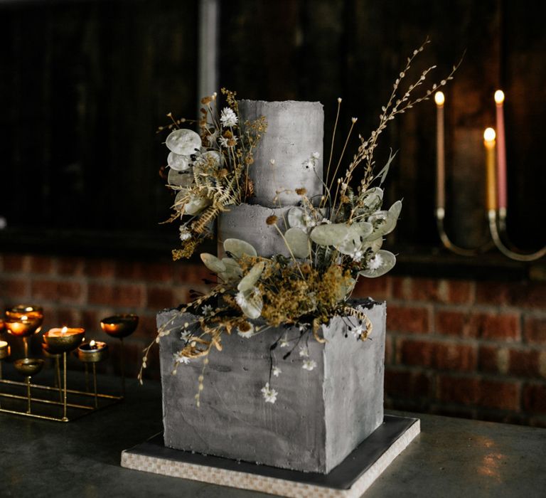 Modern Grey Concrete Wedding Cake with Moss, Eucalyptus and Twig Decor