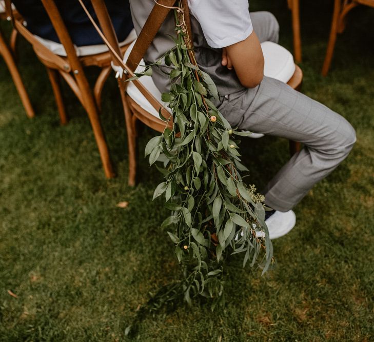 Hanging foliage aisle chair decor