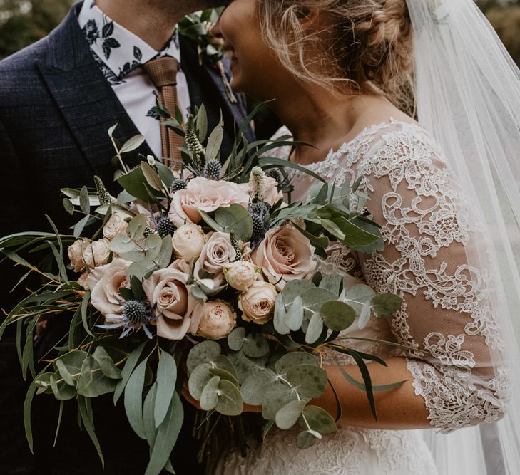 Dusky pink rose and eucalyptus wedding bouquet