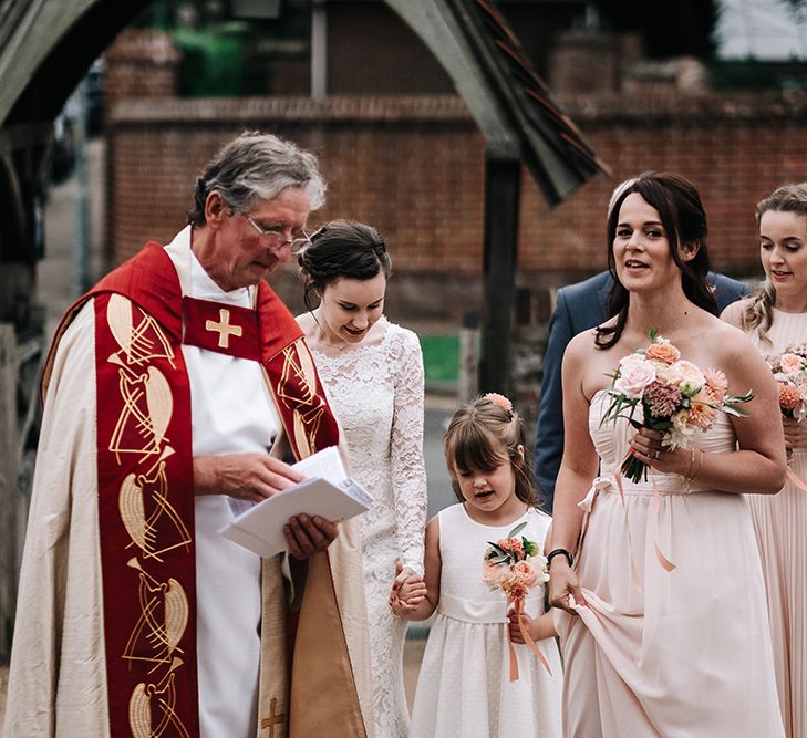 Bridal Party Church Entrance | Peach Wedding at Swanton Morley House and Gardens in Norfolk |  Jason Mark Harris Photography | Together we Roam Films