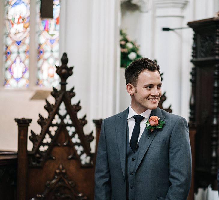 Groom at the Altar in Next Suit | Peach Wedding at Swanton Morley House and Gardens in Norfolk |  Jason Mark Harris Photography | Together we Roam Films