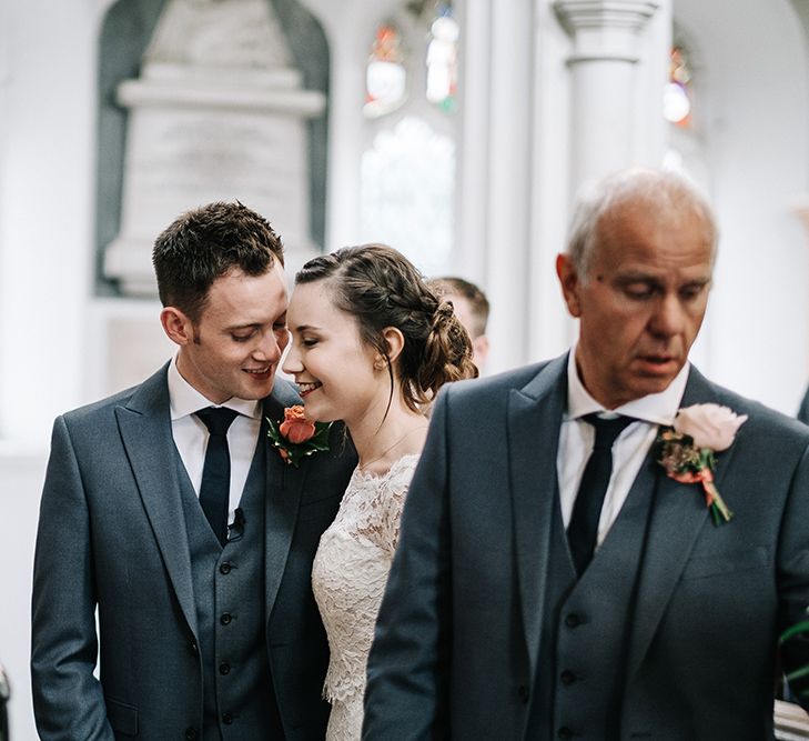 Groom at the Altar in Next Suit | Bride in Lace Wedding Dress | Peach Wedding at Swanton Morley House and Gardens in Norfolk |  Jason Mark Harris Photography | Together we Roam Films